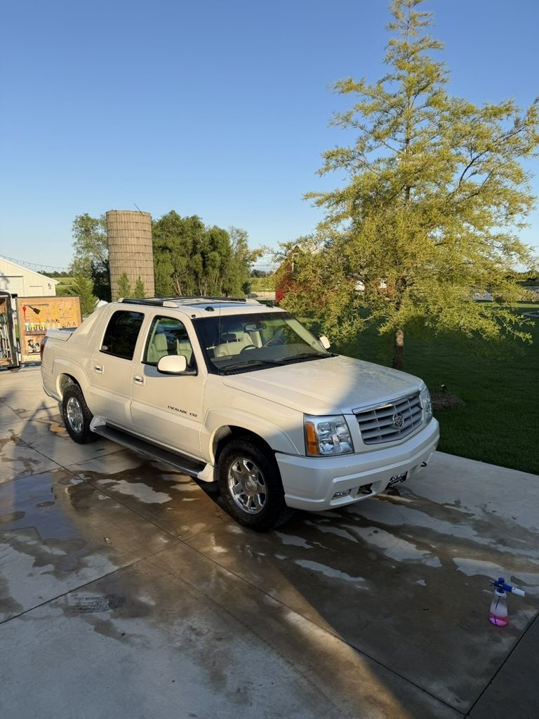 Cadillac Escalade EXT, mobile detailed by Blue Badge Customs in Lawrence, Kansas