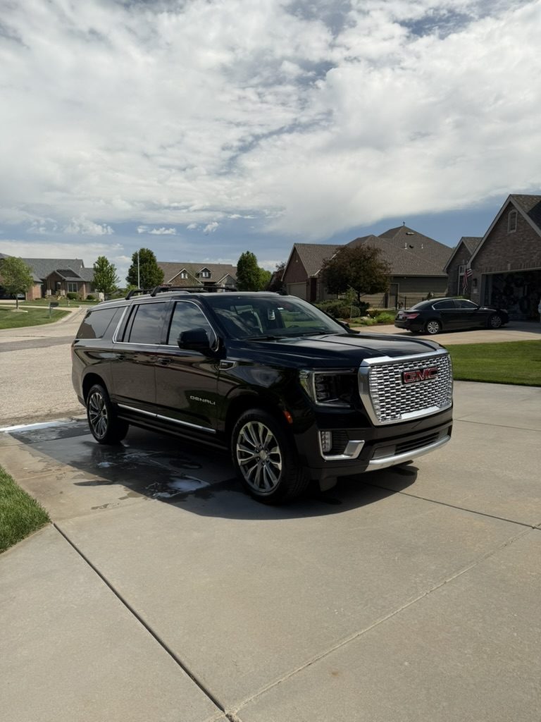 GMC Yukon XL Denali, mobile detailed by Blue Badge Customs in Lawrence, Kansas